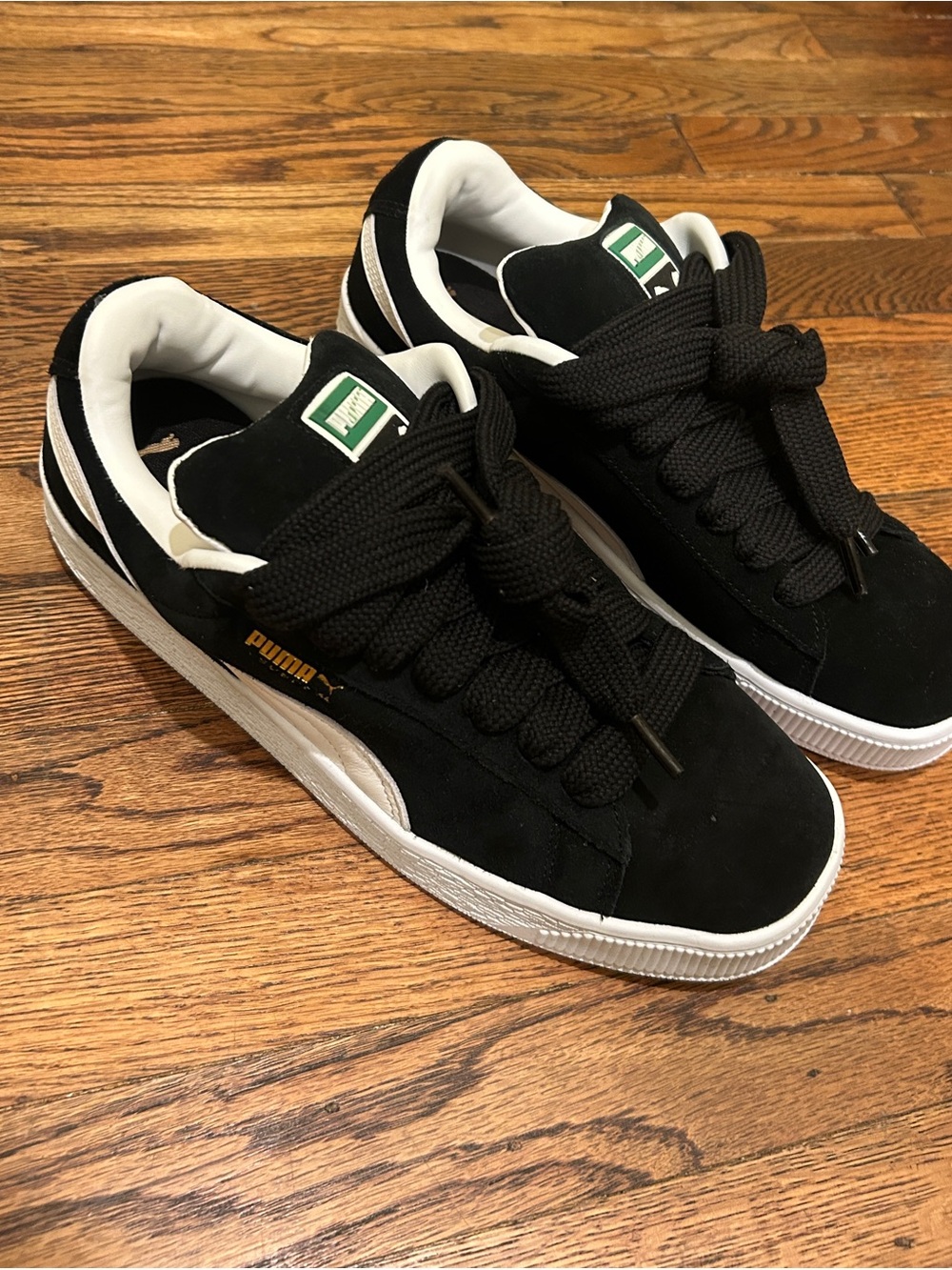 Puma Black and White Suede Low-Top Sneakers